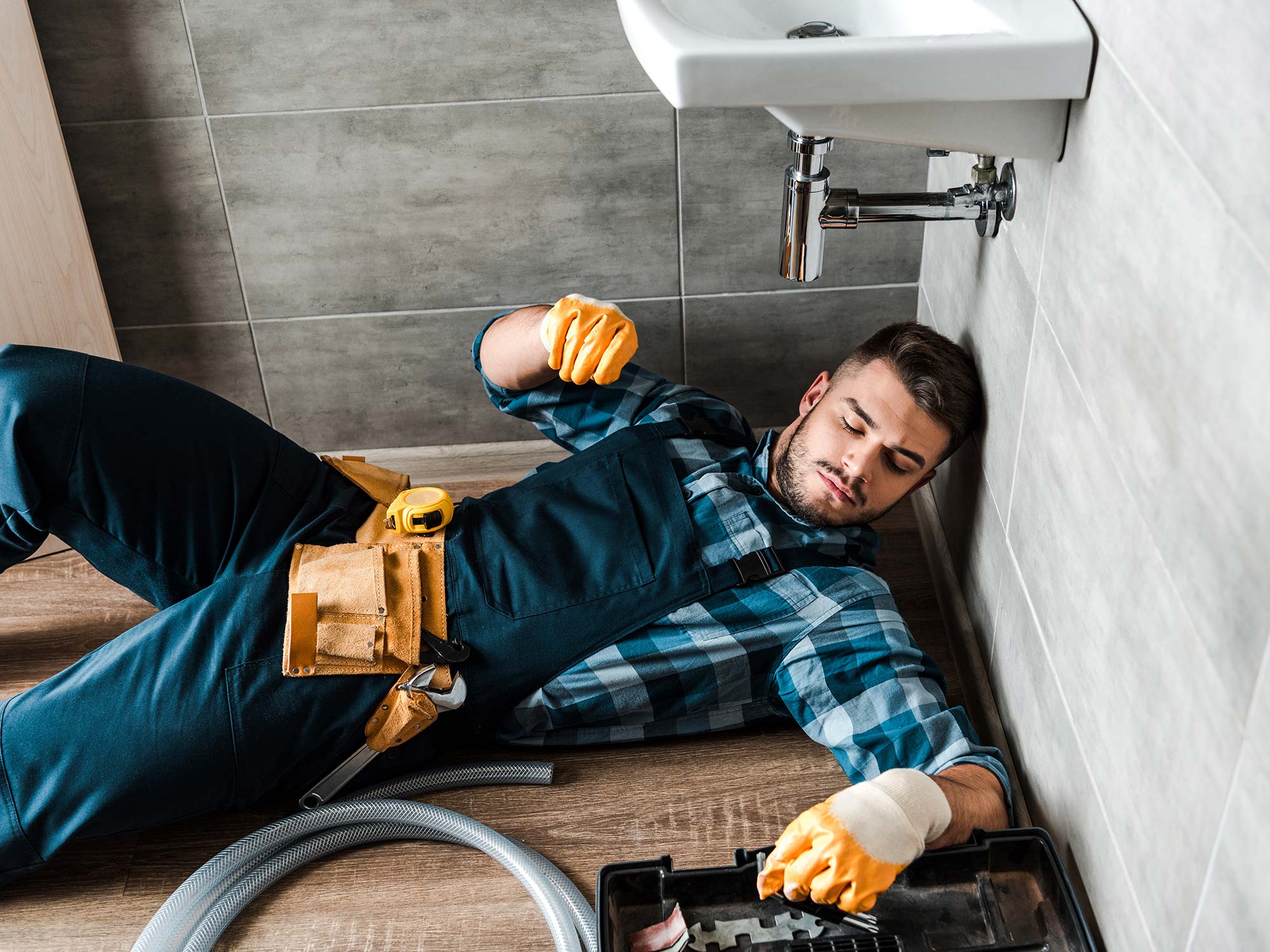 bearded-handyman-lying-on-floor-near-toolbox-in-ba-resize.jpg bearded-handyman-lying-on-floor-near-toolbox-in-ba-resize.jpg
